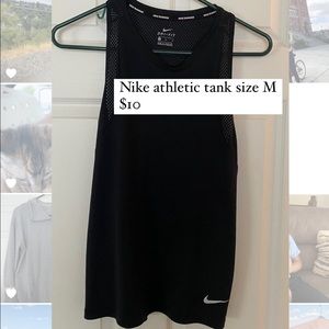 Nike athletic tank. Size medium, worn about 3 times. Mesh detail